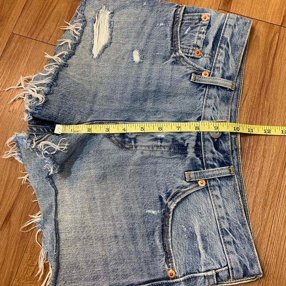 Levi’s High Rise Raw Hem Distressed Jean Shorts - Picture 8 of 10